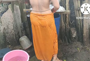 Anita yadav bathing outside with hot